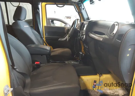 2015 Jeep Wrangler Unlimited Sahara z USA, uszkodzony, nr VIN 1C4BJWEG2FL696768